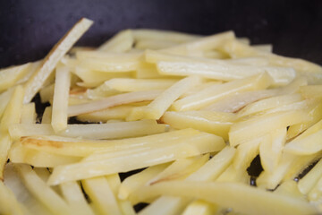 fried potatoes at home in a frying pan