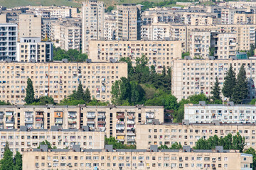 Fototapeta na wymiar Residential area of Tbilisi, multi-storey buildings in Gldani and Mukhiani