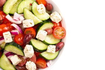 Bowl of Fresh Greek Salad with Cucumbers Tomatoes Olives and Feta Cheese