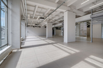 Modern white empty room interior with columns and panoramic windows.  room for office or store