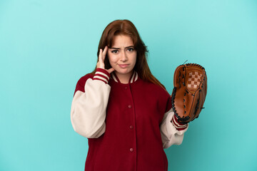 Young redhead woman playing baseball isolated on blue background thinking an idea
