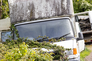 derelict van dumped on a country path