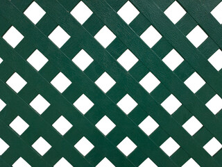 background cross-shaped pattern of green color from wood on a white background
