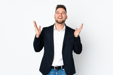 Fototapeta premium Young Russian business man isolated on white background laughing