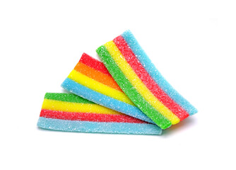 Rainbow chewy jelly isolated on white background. Colorful jelly candy. Unhealthy food, toxic kids...