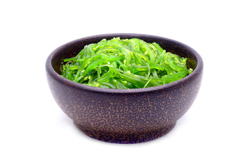 Wakame Salad in traditional Japanese ceramic bowl isolated on white background. Famous Japanese appetizer