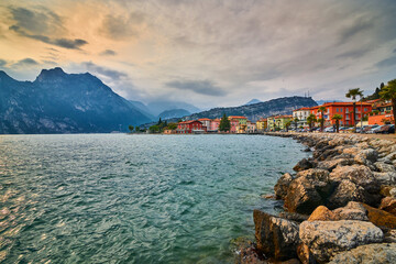 View of the beautiful Lake Garda in the springtime,Torbole city surrounded by mountains in Trentino alto Adige region,italy