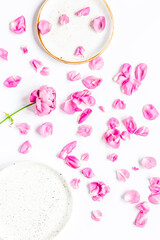 Obraz na płótnie Canvas spring floral design with rose petals in soft light top view mock-up