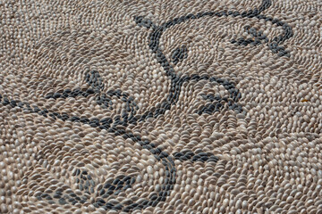 Embossed paving of pavement from stones with patterns