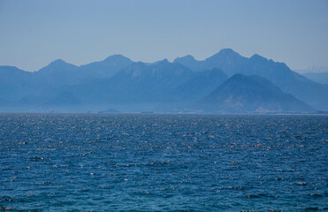 Fototapeta na wymiar View of the mediterranean sea against the backdrop of high taurus mountains