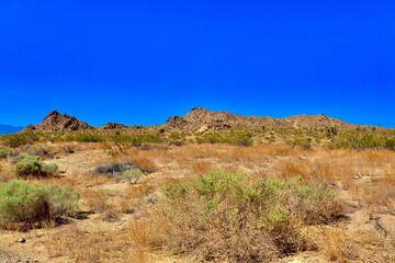 California Desert Landscape with Mountains and Clear Blue sky  