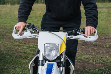 How to drive motorcycle training, teacher explaining how to use fingers on throttle and clutch...