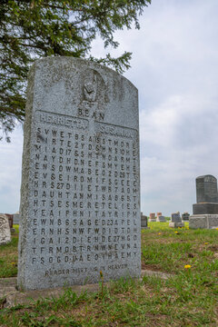 A gravestone in Rushes Cemetery in rural Ontario has an encrypted inscription.
