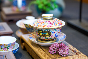 Chinese style painted teapots, cups and various tea sets