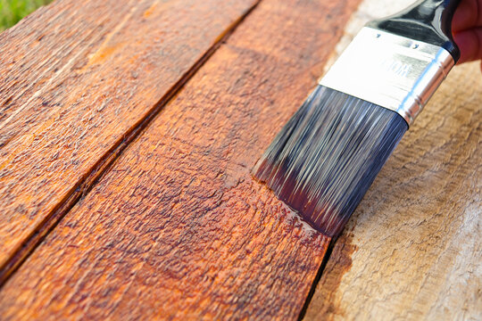 Outdoors Wood Surface Sealant Paintbrush Application Close-up