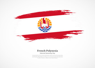 Happy internal autonomy day of French Polynesia with national flag on grunge texture