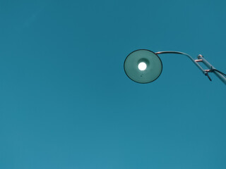 City street light with blue sky background. Minimalism concept.