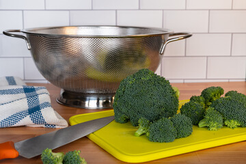 Broccoli florets on cutting board