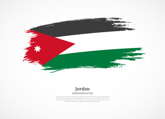 Happy independence day of Jordan with national flag on grunge texture