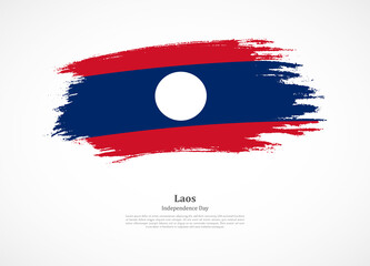 Happy independence day of Laos with national flag on grunge texture