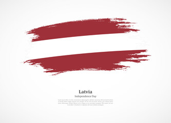 Happy independence day of Latvia with national flag on grunge texture