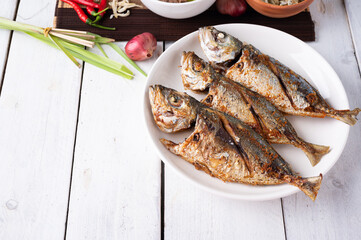 Deep fried mackerel with fish sauce, Traditional Thai food.