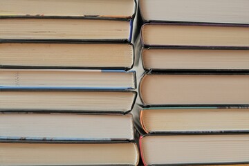 Stack books close-up.Reading books.School time. Education and knowledge concept.Back to school. Encyclopedic knowledge