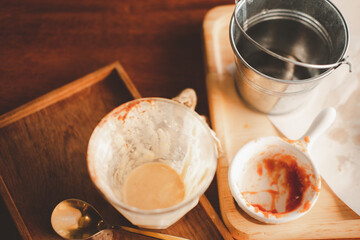 Empty cup of coffee and food after drink at cafe