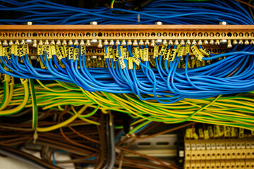 Fototapeta premium Terminal block with wires in the switchboard.