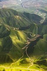 Aerial photos of mountains, grasslands and roads in Urumqi, Xinjiang Province, China