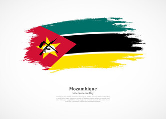 Happy independence day of Mozambique with national flag on grunge texture