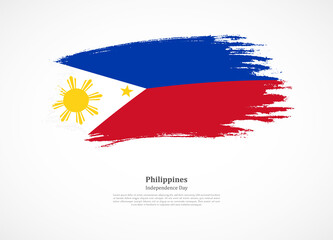 Happy independence day of Philippines with national flag on grunge texture