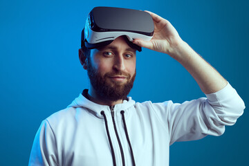 Man ready to put the VR goggles on and dive into virtual reality world