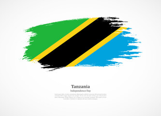 Happy independence day of Tanzania with national flag on grunge texture