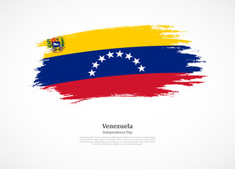 Happy independence day of Venezuela with national flag on grunge texture