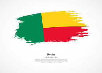 Obraz premium Happy independence day of Benin with national flag on grunge texture