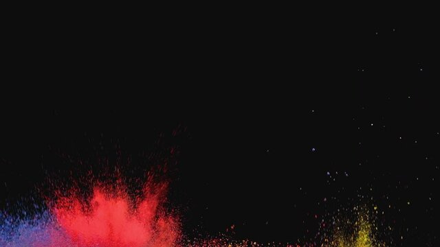 The splashes of colorful particles. slow motion
