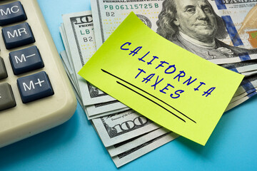 Business concept meaning CALIFORNIA TAXES with sign on the page.