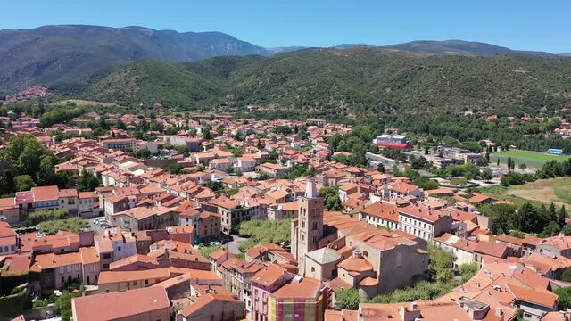 Panoramic aerial view of Prades cityscape with buildings and streets, Tarragona, Catalonia, Spain. High quality 4k footage