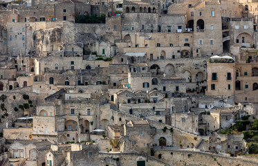 Panoramic view of Sassi di Matera a historic district in the city of Matera, well-known for their ancient cave dwellings from the Belvedere di Murgia Timone,  Basilicata, Italy