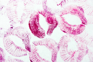 Pink kisses isolated on white background. Beautiful lips stamps. Romantic mood.