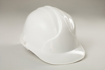 White construction hard hat on a white background. Mock-up.