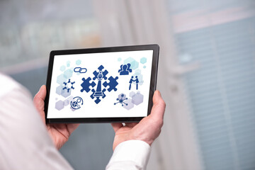 Strategic alliance concept on a tablet