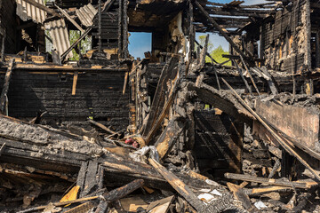 Ruins of a burnt down old residential building