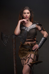 Barbaric woman viking with hand under her chin