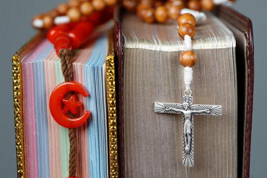 Religious Symbols. Quran, Bible And Prayer Beads. Christianity, Islam. Interfaith Dialogue.