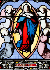 Cordeliers church.  Stained glass window.  The Assumption of Mary into Heaven.  Lons le Saunier. France.