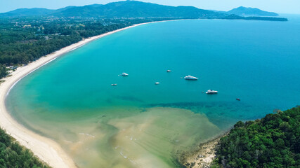 Aerial view from drone on tropical coastline with turquoise sea. Travel destinations. Summer...