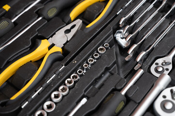 A set of black and yellow tools