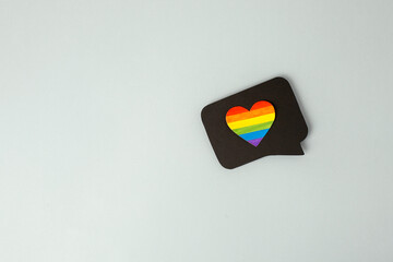 Happy Pride month banner for lgbt rights or social issues event in june. Colorful rainbow heart in black social media interaction cloud, ideal symbol for homosexual love, marriage, partnership, sex